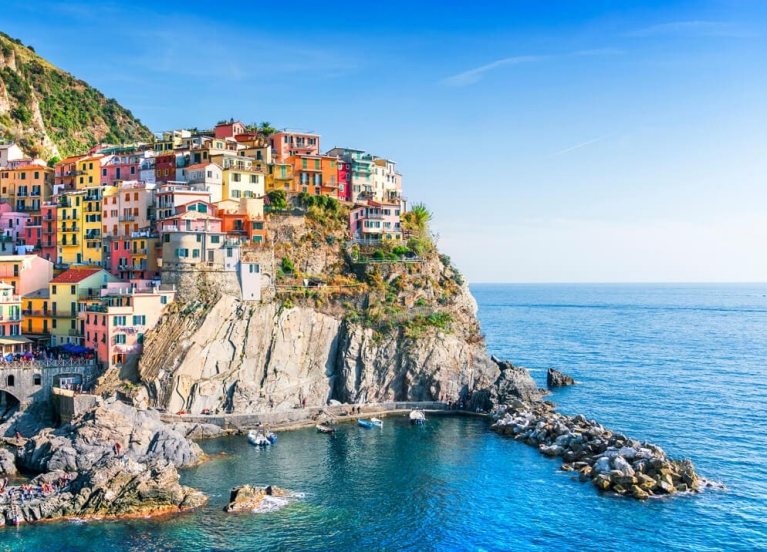 A colourful seaside town atop a hill