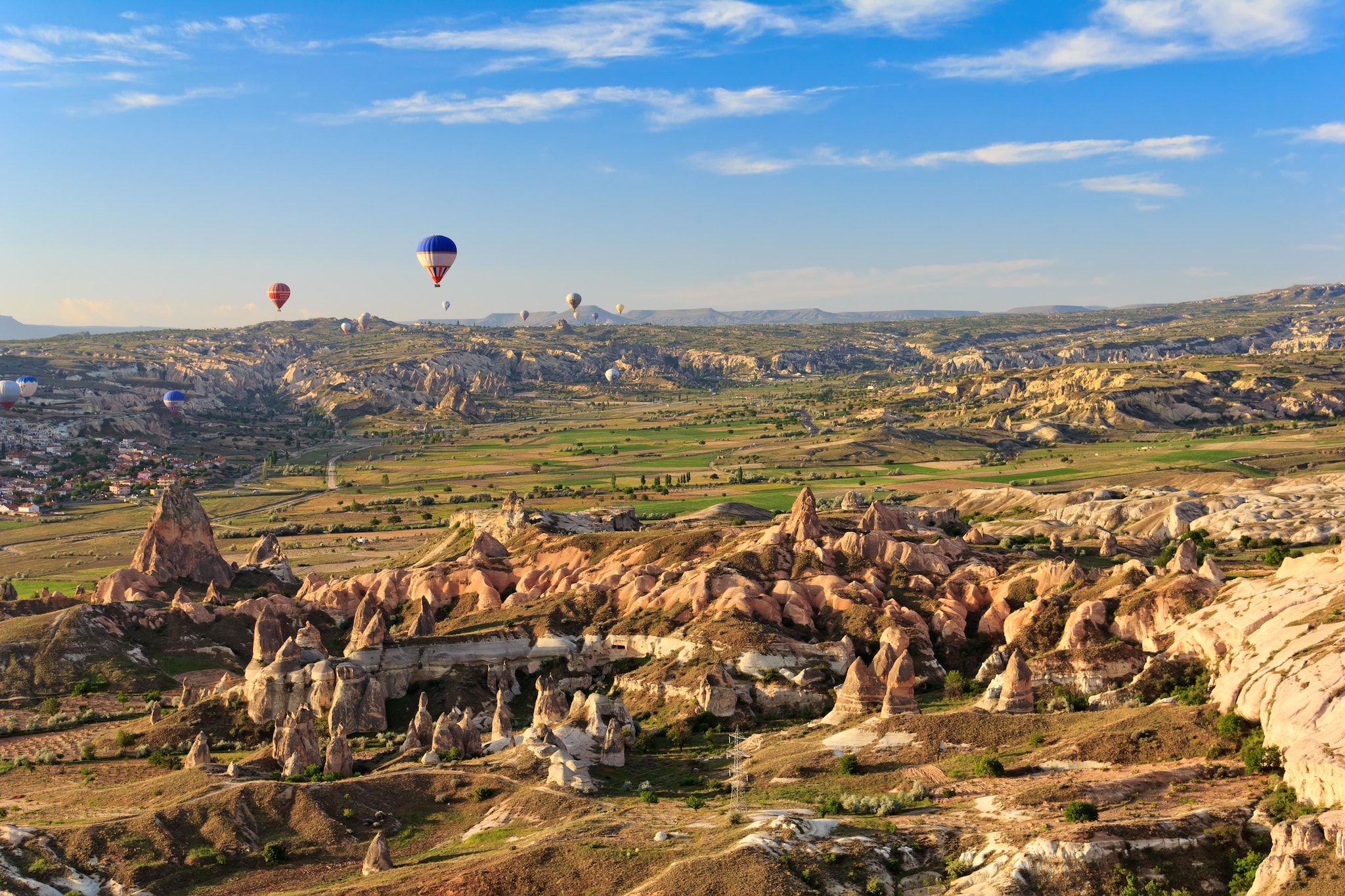 Hot air balloons flying over Cappadocia