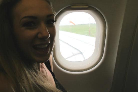 interrail_customer_testimonials_-_excited_girl_in_the_airoplane