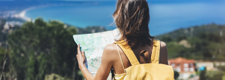 trip-plan-map-woman-bag-sea