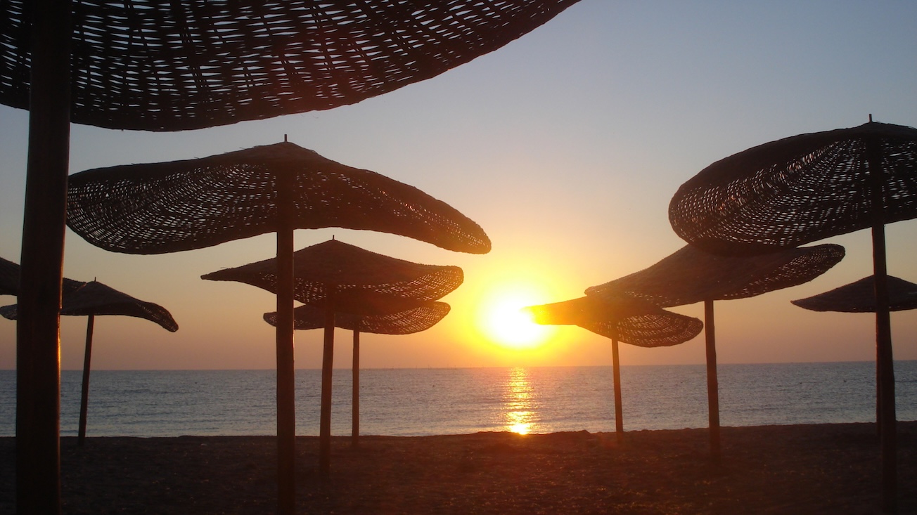 romania-constanta-vama-veche-black-sea-umbrella-beach-sunrise