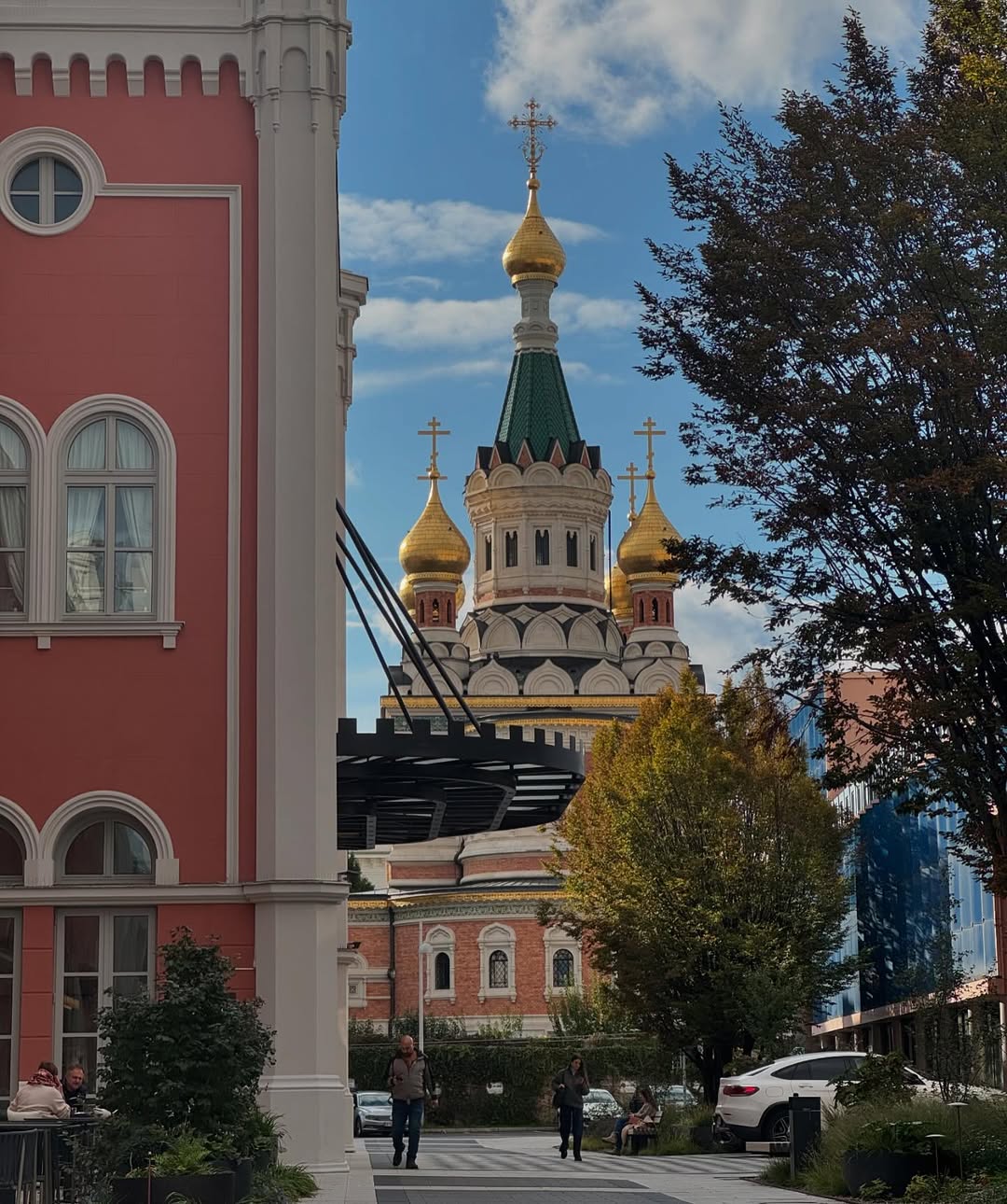 A colourful church in Vienna, with spires and domes