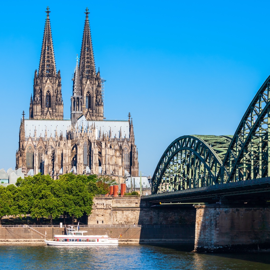 The Cologne Cathedral and Hohenzollern Bridge as viewed from the other side of the Rhine River